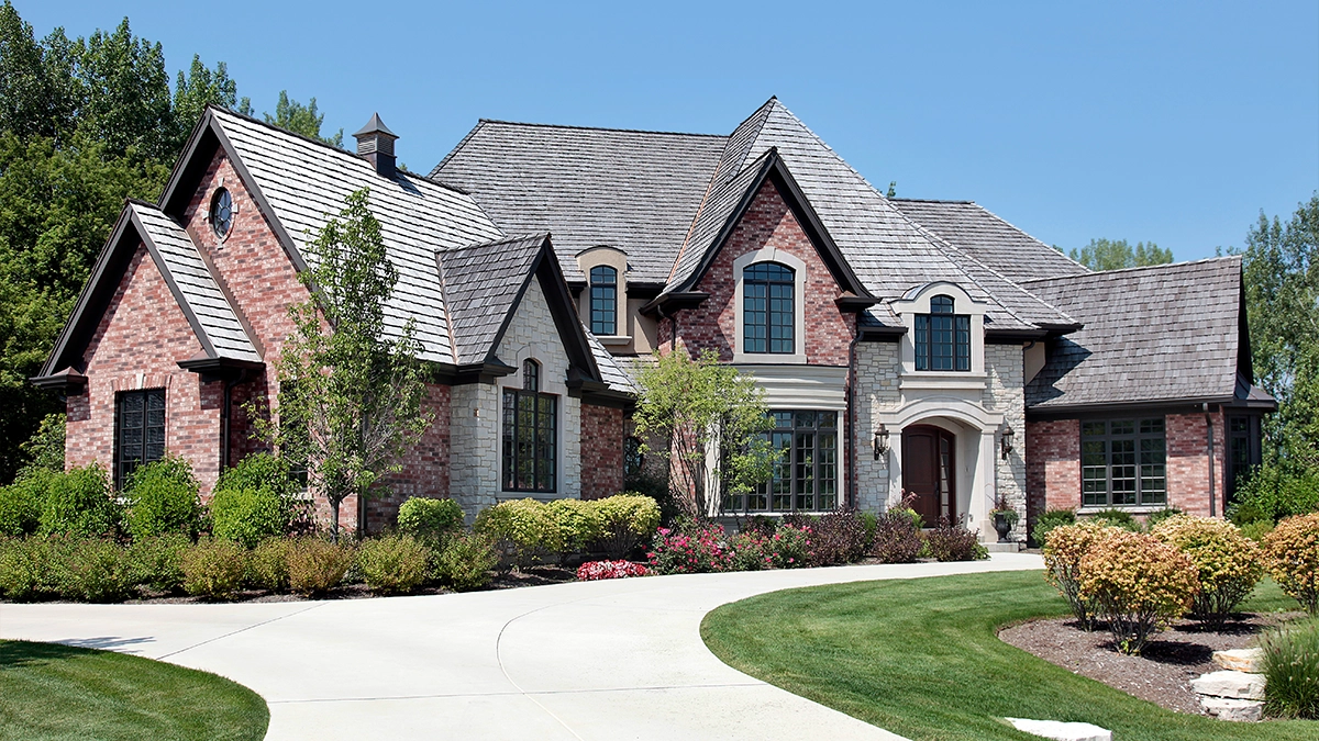 Large brick home with circular driveway