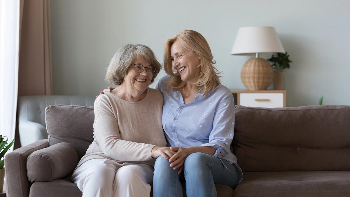Middle-aged woman visit old mother